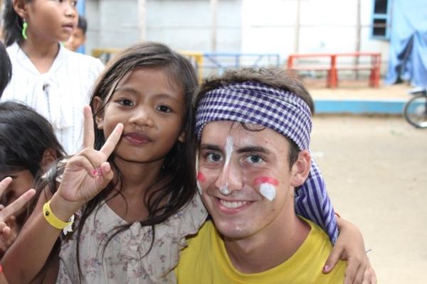 Fernando during summer camp with a little girl from PSE